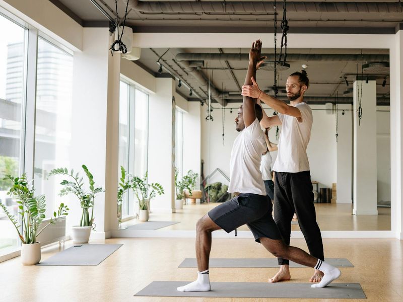 Elegant yoga practitioner holding a steady balance pose.